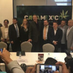 Demitri Downing at a Press Conference for CannaMexico with many Mexican officials.